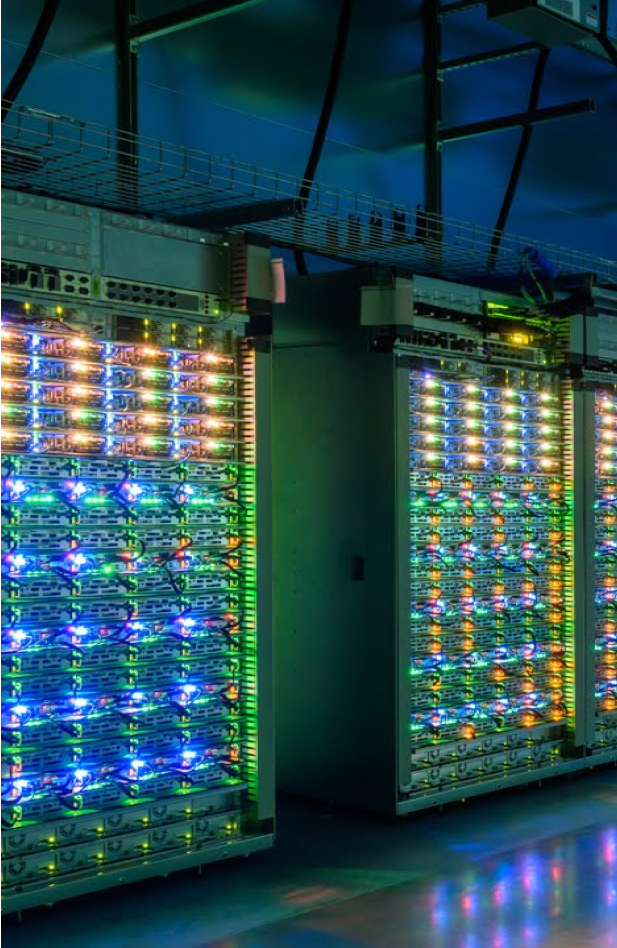 Inside of a data center with lit up data servers