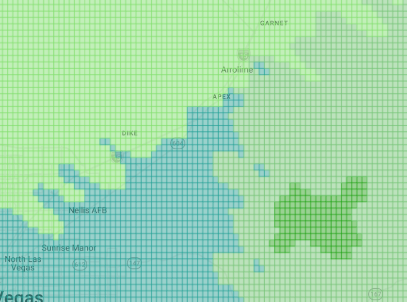A color-coded city map with yellow and purple data points over a street grid, enclosed by a boundary line.